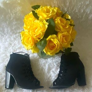 Black heeled boots from JustFab